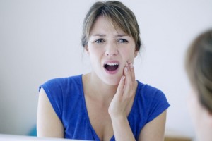 girl with tooth pain