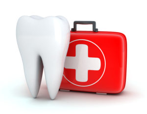Larg tooth next to emergency dental case